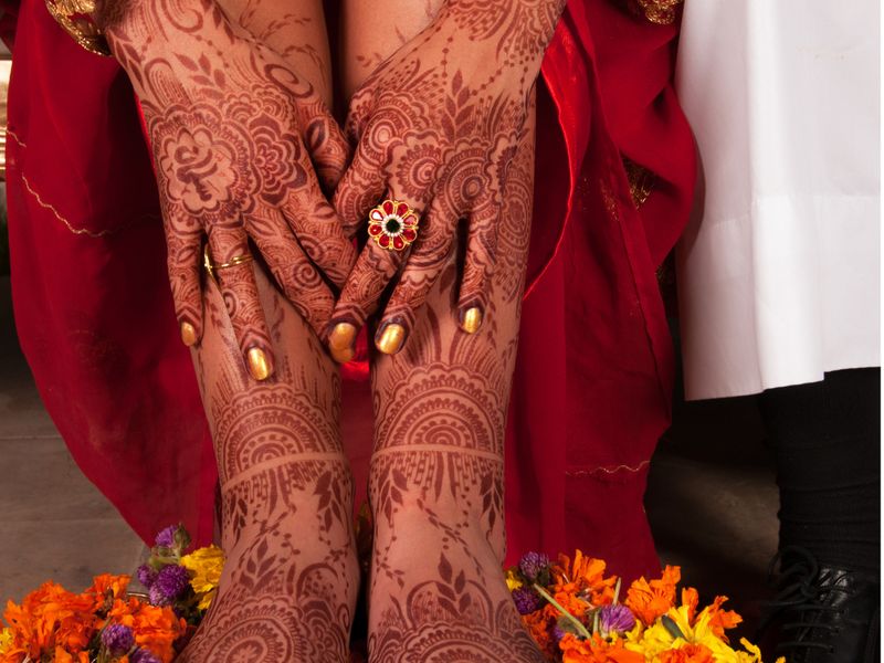 Wedding guests taking photos with their phones to share via a QR code album